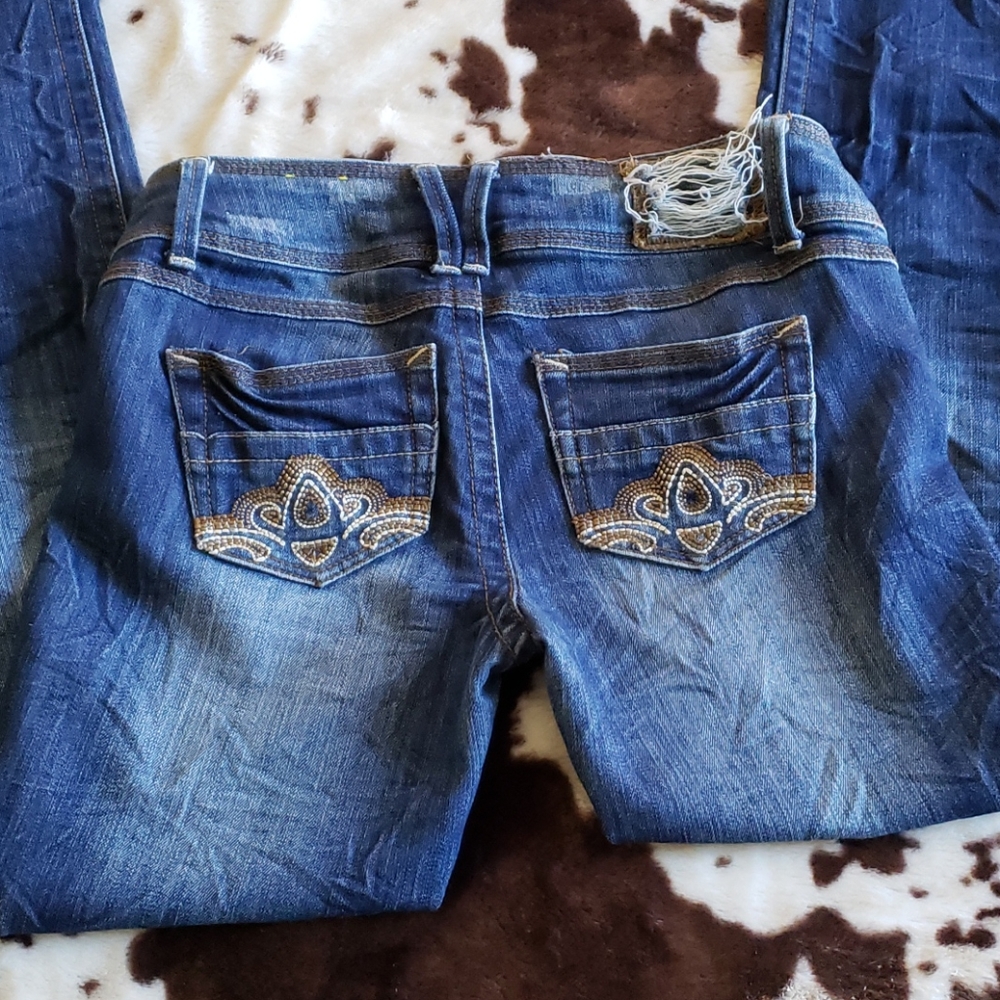 Distressed skinny jeans - Picture 3 of 3